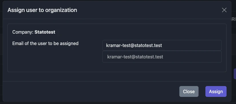 Screenshot: Assign user modal with email field and matching suggestions